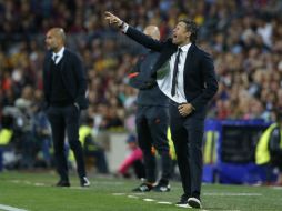 Luis Enrique le ganó la partida a Pepguardiola, que salió cabizbajo de la fuera su casa. AP / E. Morenatti