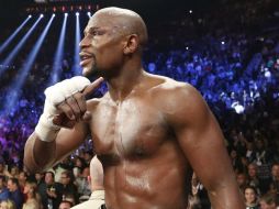 Ganar a Mayweather lo pondría entre los grandes del boxeo, cree Khan. EFE / ARCHIVO