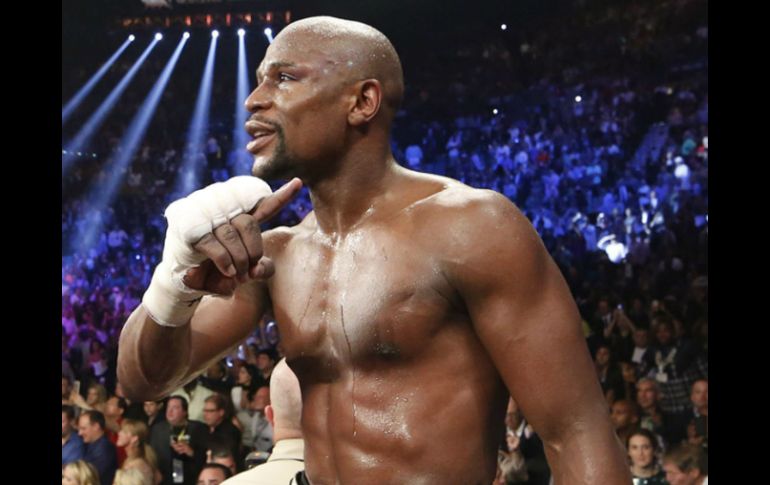 Ganar a Mayweather lo pondría entre los grandes del boxeo, cree Khan. EFE / ARCHIVO