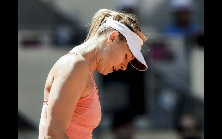 La rusa María Sharapova sucumbe ante su compatriota Svetlana Kuznetsova. AFP / D. Pozo