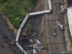 Los investigadores encuentran las cajas negras del tren donde están guardados los datos; esperan obtener información crucial. EFE / J. Lo Scalzo