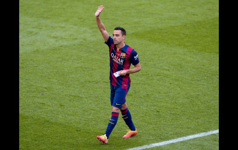 Xavi Hernández deja a sus 35 años el club en el que ingresó con 11. Su próximo destino será el Al Sadd catarí. AFP / J. Lago