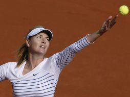 Kanepi jugó sus mejores minutos e igualó 3-3, pero Sharapova se repuso y logró el partido tras una doble falta de su rival. AFP / P. Kovarik