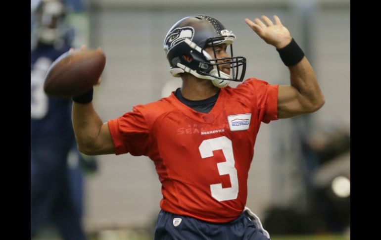 El quarterback Russell Wilson está preparado para jugar toda la temporada 2015. AP / T. Warren