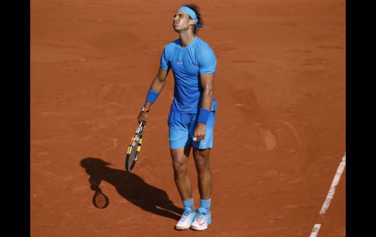 Rafa Nadal no pudo defender su título. AFP / P. Kovarik