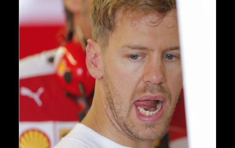 Vettel vuelve a la pista con menos de tres minutos para el final de la Q1, pero no le alcanza. EFE /