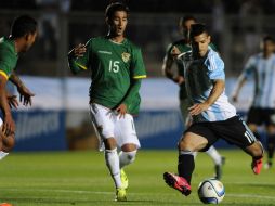 Sergio 'Kun' Agüero (11) se despachó con tres goles ante los bolivianos. Los otros dos tantos argentinos fueron obra de Di María. AFP / A. Larrovere