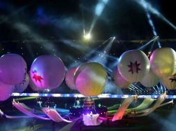 El momento más emotivo de toda la ceremonia se lo llevó la entrada de doce gigantescos globos de helio. AFP /