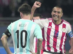 El capitán paraguayo, Paulo Da Silva (14), celebra el gol del empate sobre el cierre del partido. AFP / J. Mabromata