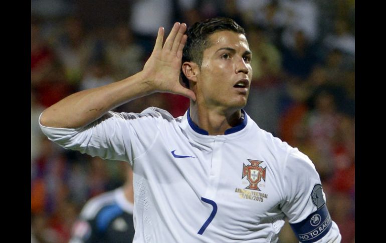 'CR7' se despidió de su selección por la puerta grande con un 'hat-trick' ante la escuadra de Armenia. AFP / K. Minsayan