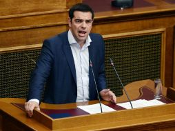 Tsipras dijo que los deudores envían el mensaje de que un mandato popular no puede cambiar las cosas. AFP / L. Gouliamaki