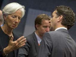 El presidente del Eurogrupo y titular de Finanzas holandés, Jeoren Dijsselbloem conversa con Christine Lagarde, directora del FMI. AP / V. Mayo