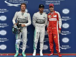 De izquierda a derecha, Nico Rosberg, Lewis Hamilton y Sebastian Vettel. AFP / A. Isakovic