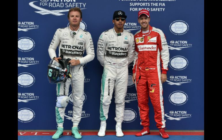 De izquierda a derecha, Nico Rosberg, Lewis Hamilton y Sebastian Vettel. AFP / A. Isakovic