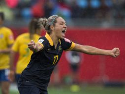 La victoria permitió a Australia conseguir por primera vez en su historia el pase a los cuartos de final del mundial. AP / A. Vaughan / The Canadian Press