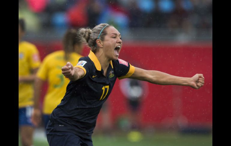 La victoria permitió a Australia conseguir por primera vez en su historia el pase a los cuartos de final del mundial. AP / A. Vaughan / The Canadian Press