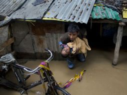 Las fuertes lluvias han provocado numerosos derrumbes en Saurashtra, la región más afectada. AP / D. Yasin