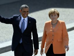 Obama y Merkel afirman que sus equipos económicos están monitoreando la situación en Grecia. AFP / ARCHIVO