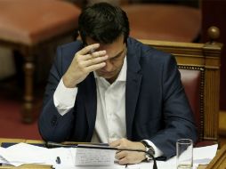 Grecia tiene hasta hoy para efectar el pago, de lo contrario, entrará en estado de mora de sus deudas frente al FMI. AP / P. Giannakouris