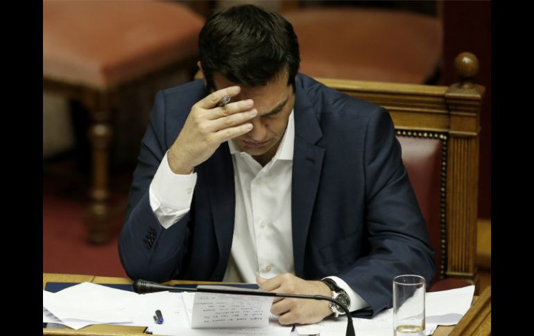 Grecia tiene hasta hoy para efectar el pago, de lo contrario, entrará en estado de mora de sus deudas frente al FMI. AP / P. Giannakouris