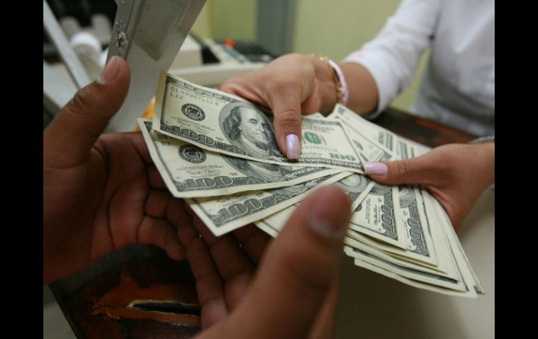 Se estima que el tipo de cambio cotice entre 15.65 a 15.71 pesos por dólar. EL INFORMADOR / ARCHIVO