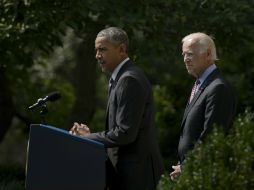 El presidente Barack Obama y el vice presidente Joe Biden, durante el anuncio esta mañana en la Casa Blanca. AFP / B. Smialowski