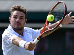 Wawrinka se verá las caras en cuartos de final con el francés Richard Gasquet. AFP / G. London