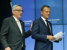 Tusk (d) admite que la salida de Grecia de la eurozona sería la más dolorosa. EFE / O. Hoslet