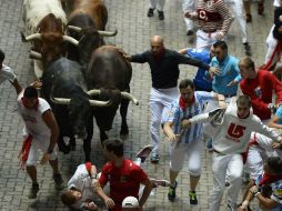 El encierro de hoy contó con animales de la ganadería El Tajo y la Reina. AFP / M. Riopa