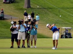 Ésta es la primera vez que juega en el Abierto Femenino de EU, lo que la convierte en la tercera jugadora en ganarlo en su debut. AP / C. Dunn