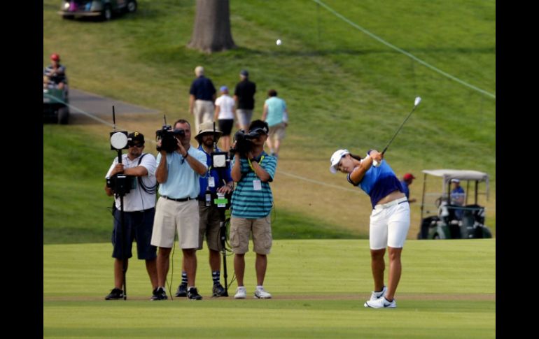 Ésta es la primera vez que juega en el Abierto Femenino de EU, lo que la convierte en la tercera jugadora en ganarlo en su debut. AP / C. Dunn