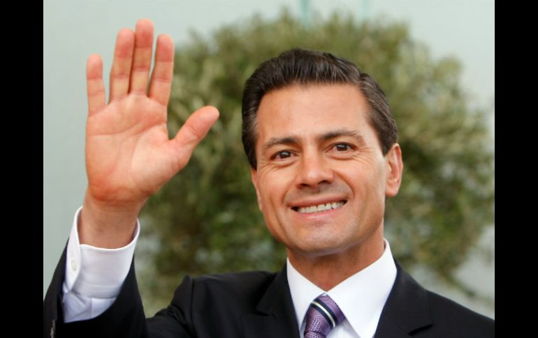 ''México es una economía abierta, competitiva y en ascenso'', asegura Peña Nieto. AP / C. Paris