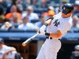 Jacoby Ellsbury batea un doble propulsor de dos carreras en la quinta entrada. AFP / M. Stobe