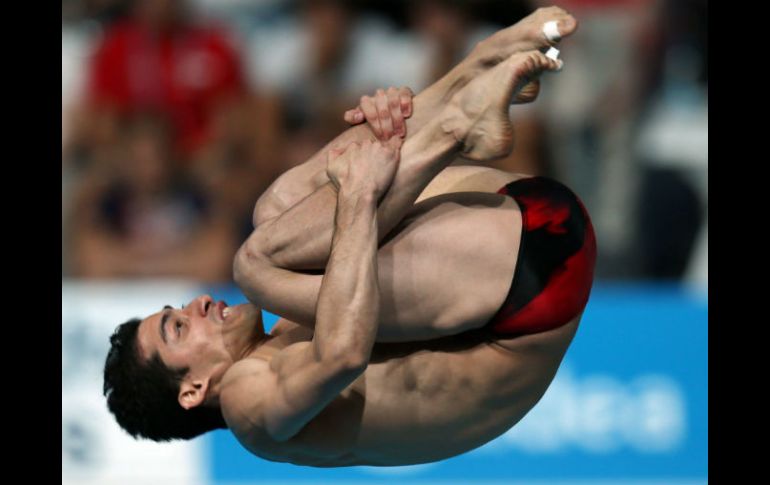 Rommel Pacheco Marrufo en la competencia de trampolín de 3 metros individual en el Campeonato Mundial de Kazán. AFP / R. Kruchinin