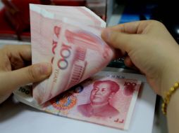 Esta devaluación de la moneda china precipitó también a principales bolsas europeas. AFP /