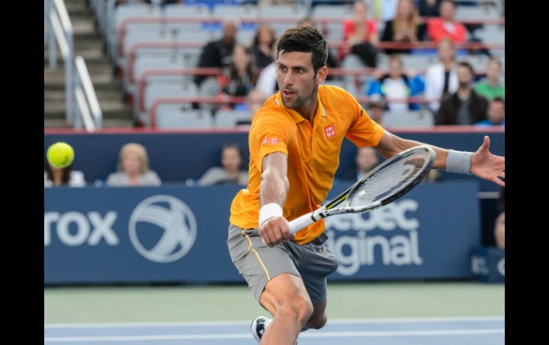 Tras conquistar el título en Wimbledon, 'Nole' volvió a la escena en las canchas canadienses para imponerse. AFP / M. Panagiotakis