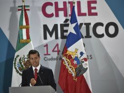 Peña Nieto refrenda en el Foro Comercio e Inversiones Chile-México el compromiso de seguir impulsando la concretación de las reformas. EFE / Y. Cortez