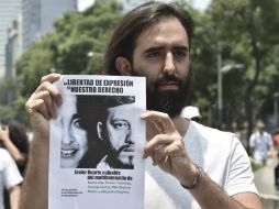 Más de 400 periodistas y escritores exigen justicia para el fotorreportero y las cuatro mujeres asesinadas. AFP / ARCHIVO