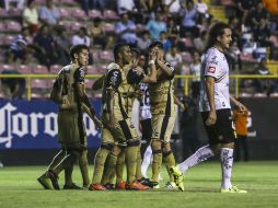 La Manada fue devorada en el Estadio Banorte por el Gran Pez, que se pone a un punto del Atlas, líder del Grupo 6. MEXSPORT / E. Serrato