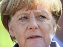 ''Es vergonzoso y repulsivo lo que experimentamos aquí'', dice Merkel en relación a los disturbios del fin de semana. AFP / T. Schwarz