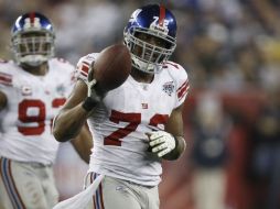 Umenyiora será recordado en Nueva York por 75 capturas y 32 balones sueltos forzados que consiguió con la casaca de Gigantes. AP /  J. Jacobson