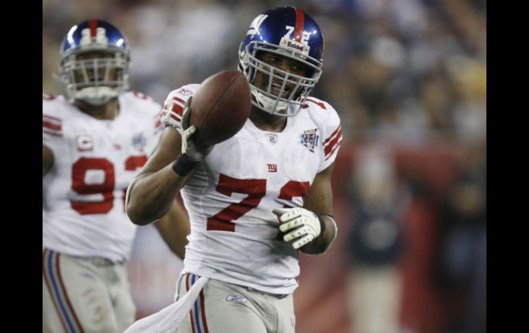 Umenyiora será recordado en Nueva York por 75 capturas y 32 balones sueltos forzados que consiguió con la casaca de Gigantes. AP /  J. Jacobson