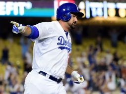 Adrián dio el triunfo a su equipo en la entrada 14. AFP / H. How