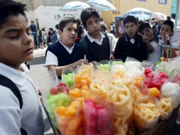 Los menores están comiendo alimentos de alta densidad calórica en grandes cantidades. EL INFORMADOR / ARCHIVO