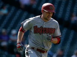 Phil Gosselin corre las bases para llegar a home después de conectar jonrón durante el partido de ayer. AFP / D. Pensinger