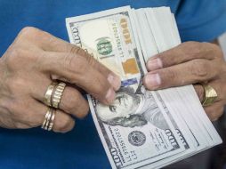 Banco Base estima que el tipo de cambio cotice en un rango entre 16.70 y 17.00 pesos por dólar. EL INFORMADOR / ARCHIVO