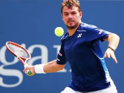 En el Louis Armstrong Stadium de Flushing Meadows, Wawrinka sufrió por tres horas ante el tenis ofensivo de Chung. AFP / Elsa