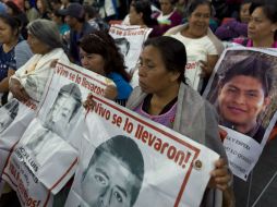 El reporte del CIDH contradice en diversos puntos la versión oficial del caso Ayotzinapa. AFP / O. Torres