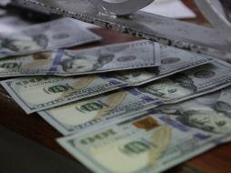 Esperan que el tipo de cambio cotice entre 16.77 y 16.90 pesos por dólar. EL INFORMADOR / ARCHIVO