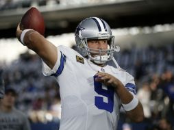 Tony Romo lanzó tres pases de anotación. AP / B. Wade